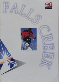 Cover with central image of a skier showing through a cut-out square.Sun shining behind a mountain on the lower left.