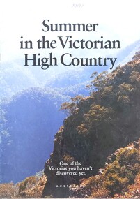 An image of tree-covered mountains with title in black text and slogan in white.