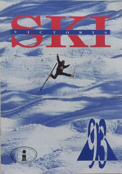 A skier leaping across the snow beneath the title banner