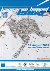 An aerial photo of a large number of skiers in the formation of the shape of a kangaroo.
