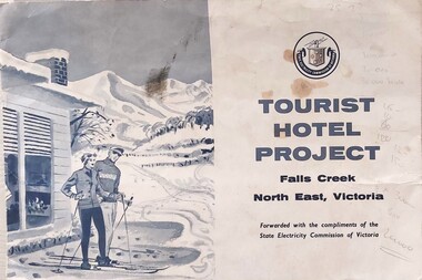 Cover for Hotel Project Folder featuring an image of two skiers in front of hotel in snow.
