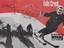 Skiers casting shadows on the snow and a map