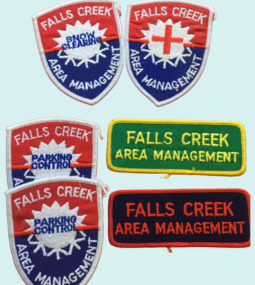A variety of clothing badge worn by employees of the Falls Creek Area Management