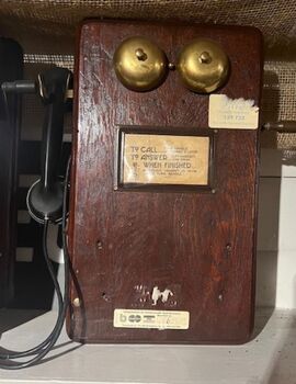 Telephone with instructions on use attached.