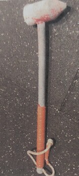 A hammer used for chipping ice from T-Bar