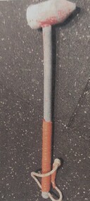 A hammer used for chipping ice from T-Bar