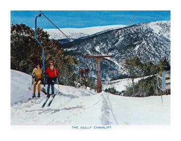 Skiers riding the The Gully Double Chairlift