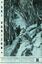 Rider on horseback in snow covered landscape.