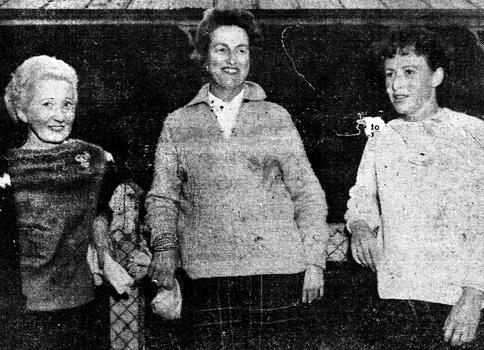 Three women who escaped from the fire with only their clothes.
