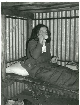 Joan Meyer relaxing inside Diamantina Hut