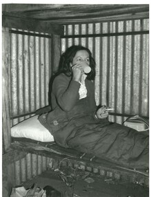 Joan Meyer relaxing inside Diamantina Hut