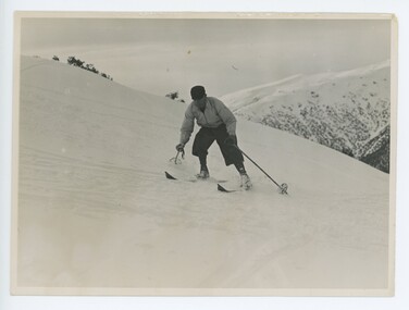 Ray Meyer skiing on a slope near "Skyline"