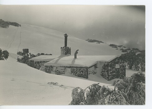 Cleve Cole Hut under a layer of snow.