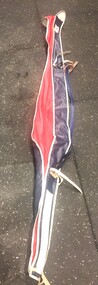 A red, white and blue ski bag from the 1960s