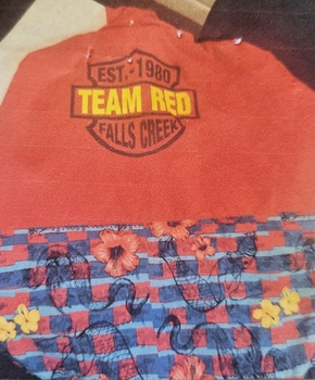 Back of jacket including embroidered logo
