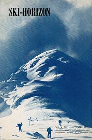 Three skiers at the foot of a mountain with a storm threatening.