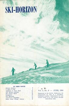 Three skiers on a slope beneath cloudy skies.