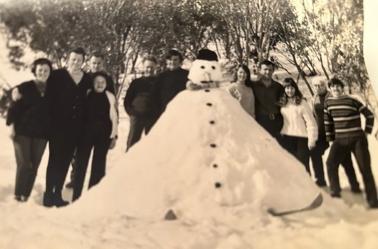 Harold and Jean Cuming with staff from the Ski Hire and Cafe