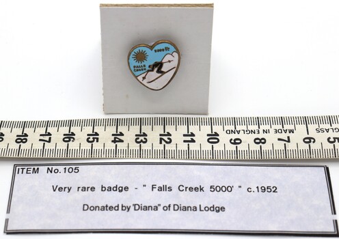 Falls Creek 5080 ft enamelled badge on board