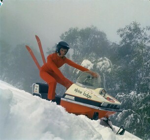 Veruschka on the Koki Snowmobile