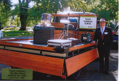 Photograph - Digital image, Frank Callahan One Man Band with his instruments on the back of truck