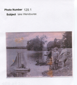 Work on paper - Three Children Floating a Sailboat at Lake Wendouree, Playing by Lake Wendouree