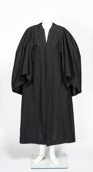 Loose fitting black ceremonial robe.