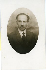 Black and white portrait in a round shape