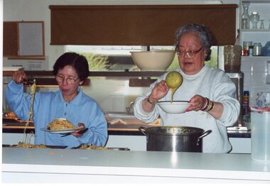 Photograph - KNH 5/7/004 Two women serving food