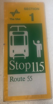 Sign - Tram Stop -   "Stop 115, Route 55" made from an aluminium sheet.