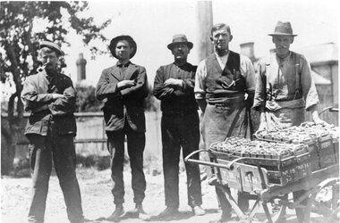 Photograph - Black and White - cable tram lighting battery workers
