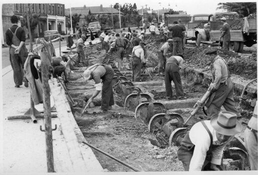 Photograph - Black and White - demolishing cable tram track Smith Street and Queens Parade North Fitzroy 1954/55