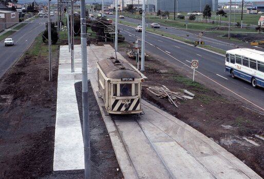 Scrubber 10W at work cleaning head of rails where new concrete section.  