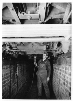 Tramcar maintainer inspecting trams Elwood Depot 