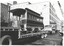 Photograph - both vehicles loaded onto semi trailers - Lonsdale St at corner with Russell St.