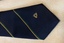 Uniform Tie - the Met logo close up