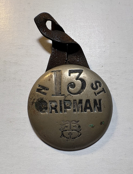 Nicholson St badge No. 13 grip man