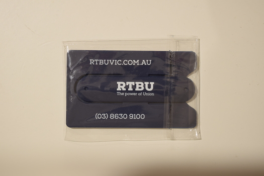 A dark blue adhesive card holder advertising the Rail Tram & Bus Union (RTBU).