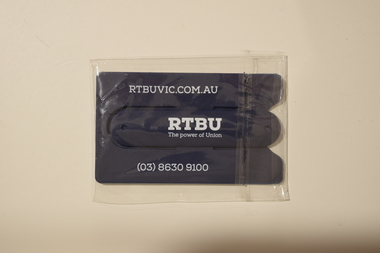 A dark blue adhesive card holder advertising the Rail Tram & Bus Union (RTBU).