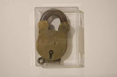 Metallic MMTB padlock and its key.