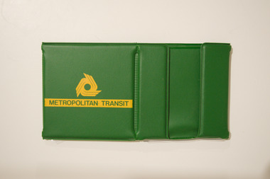 A collapsable plastic stationary used to hold paper docket books.