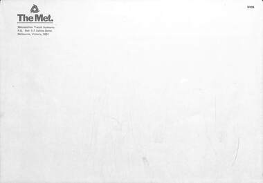 Large white envelope with The Met logo.