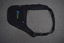 The outward-facing side of a black M>Tram CSE bag.