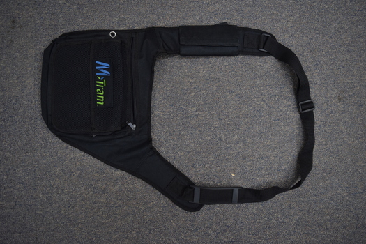The outward-facing side of a black M>Tram CSE bag.