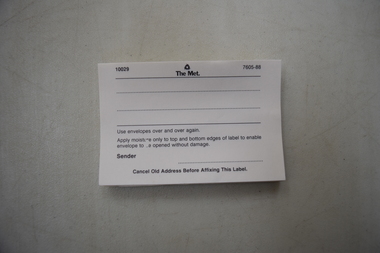 Printed side of a stack of envelope labels to seal envelopes.