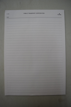 A plain A4 lined notepad with a tearable spine.