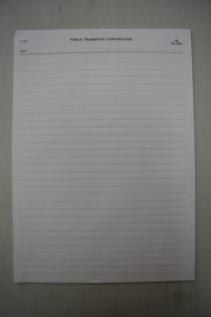 A plain A4 lined notepad with a tearable spine.