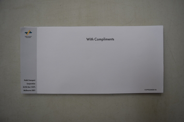 Printed side of a stack of "With Compliments" slips.