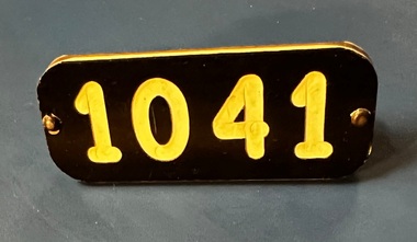 Crew number badge No. "1041"