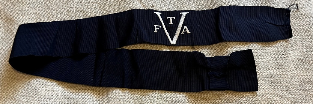 Hatband VFTA with interwoven letters.